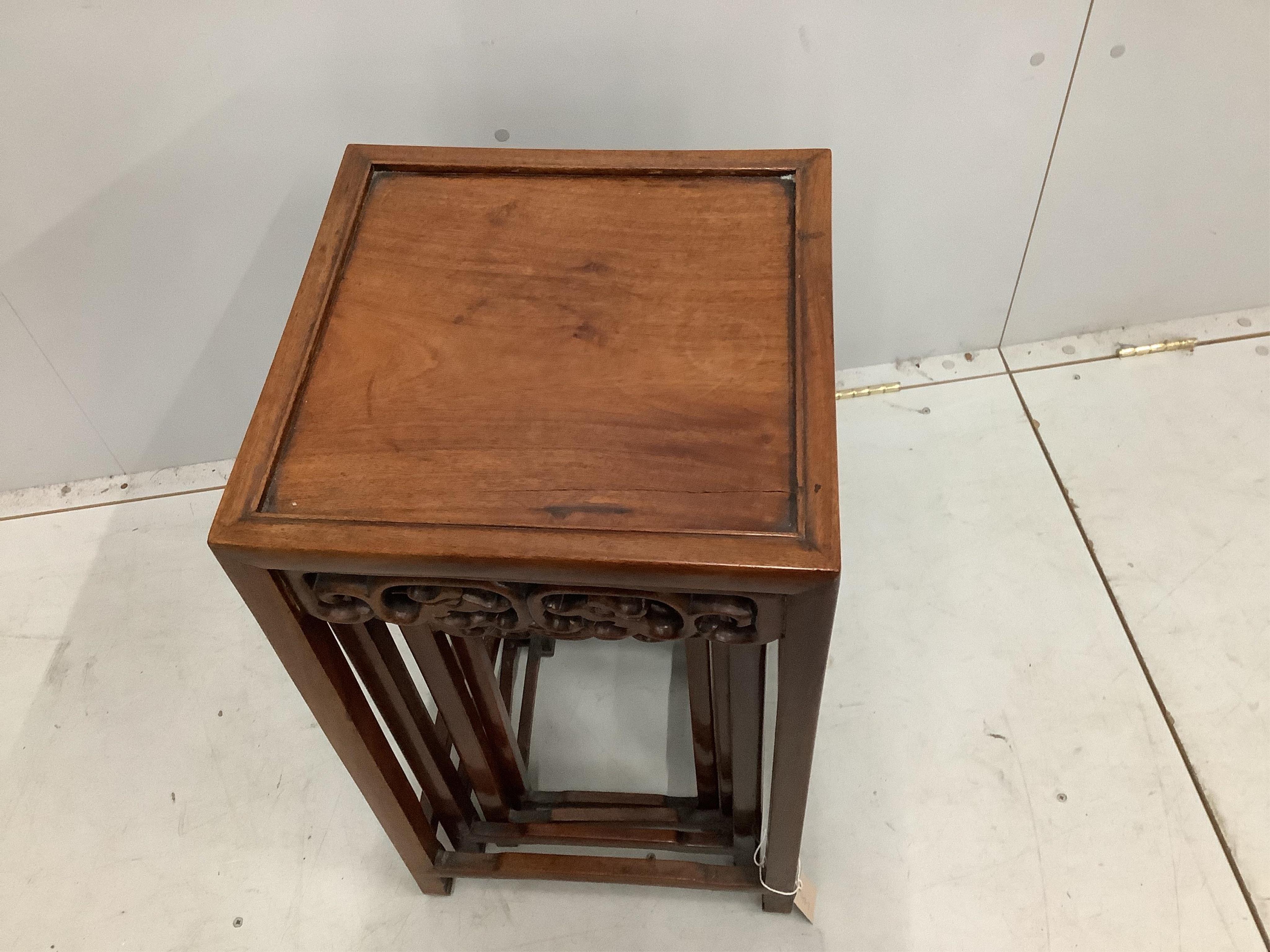 A nest of Chinese hongmu quartetto tables, largest width 38cm, height 56cm. Condition - fair